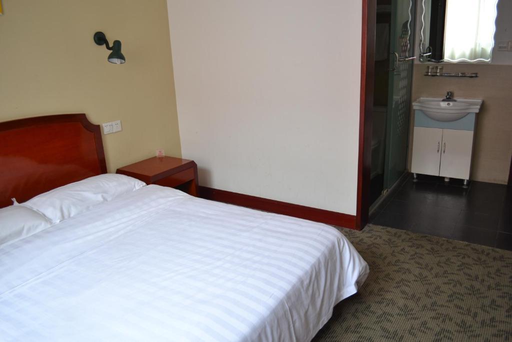 Jingyue 99 Inn Shanghai Pudong Airport Shiwan Branch Şanghay Oda fotoğraf
